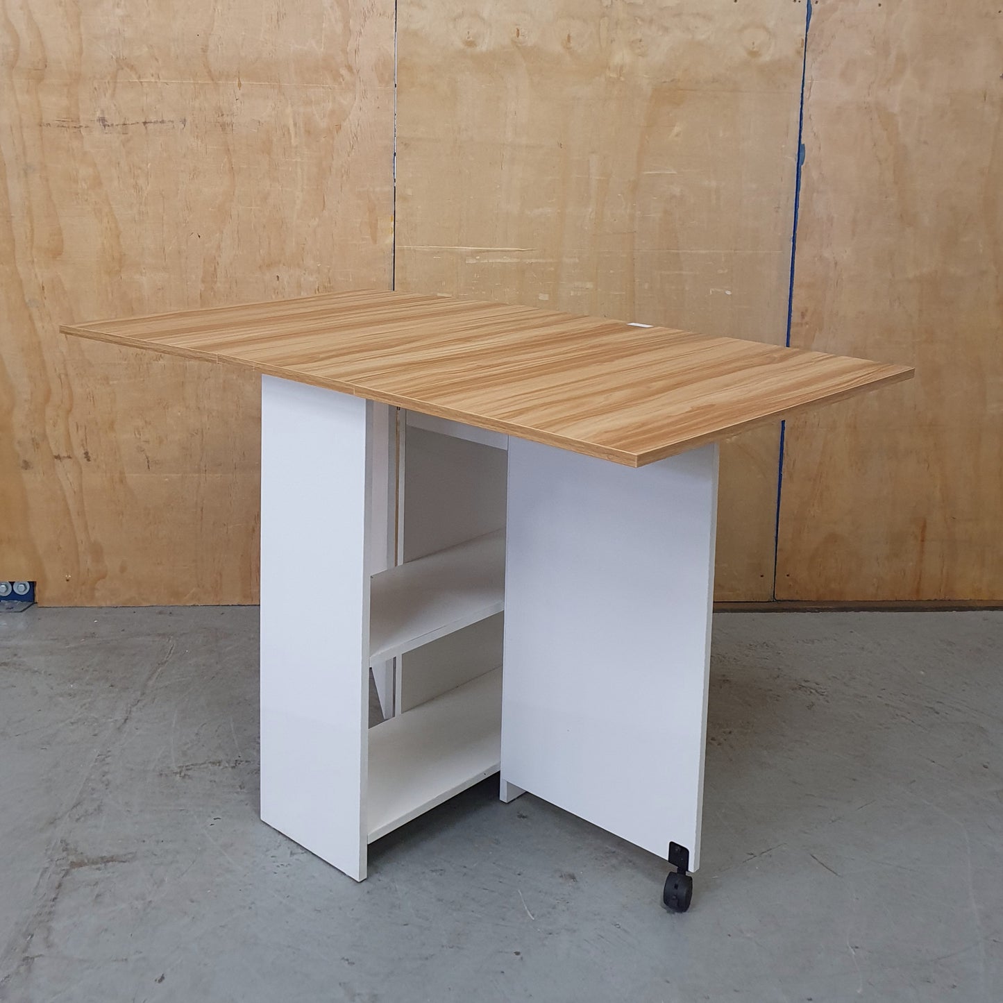 White Wood Drop Leaf Table with Lover Shelving and Castor Wheels - 103780