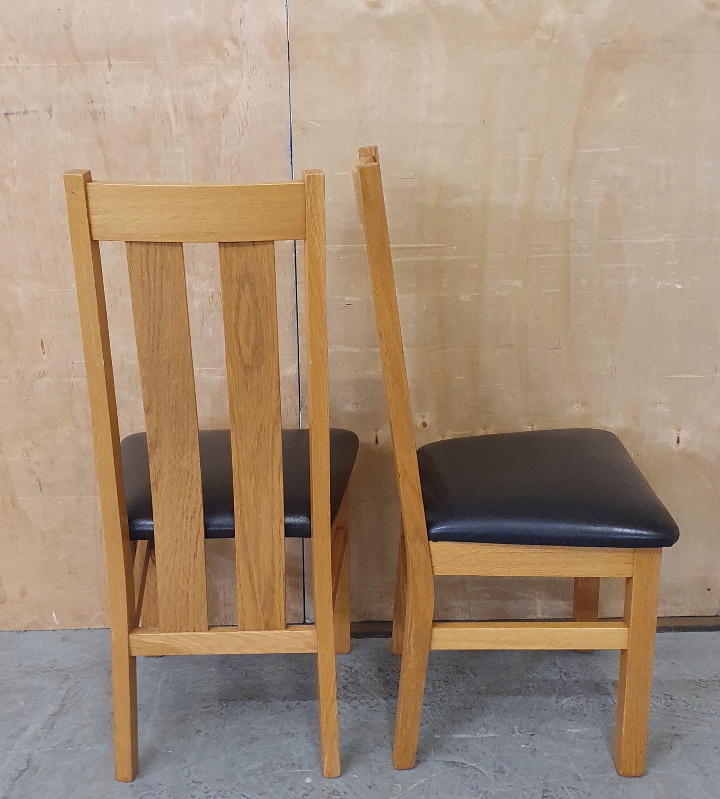 2 Matching Oak Dining Chairs with Dark Brown Faux Leather Seats - EL104354 / EL104355