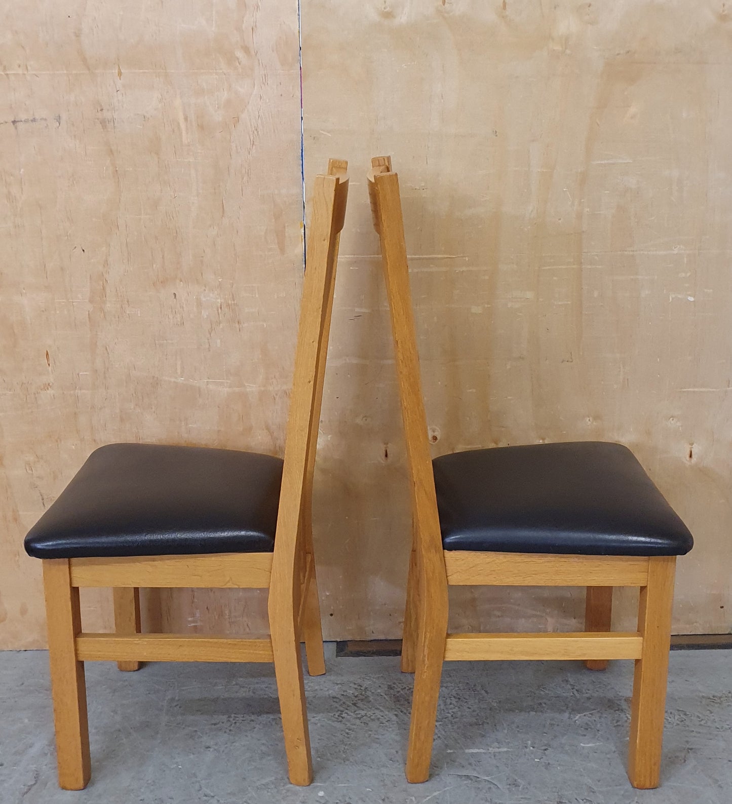 2 Matching Oak Dining Chairs with Dark Brown Faux Leather Seats - EL104354 / EL104355