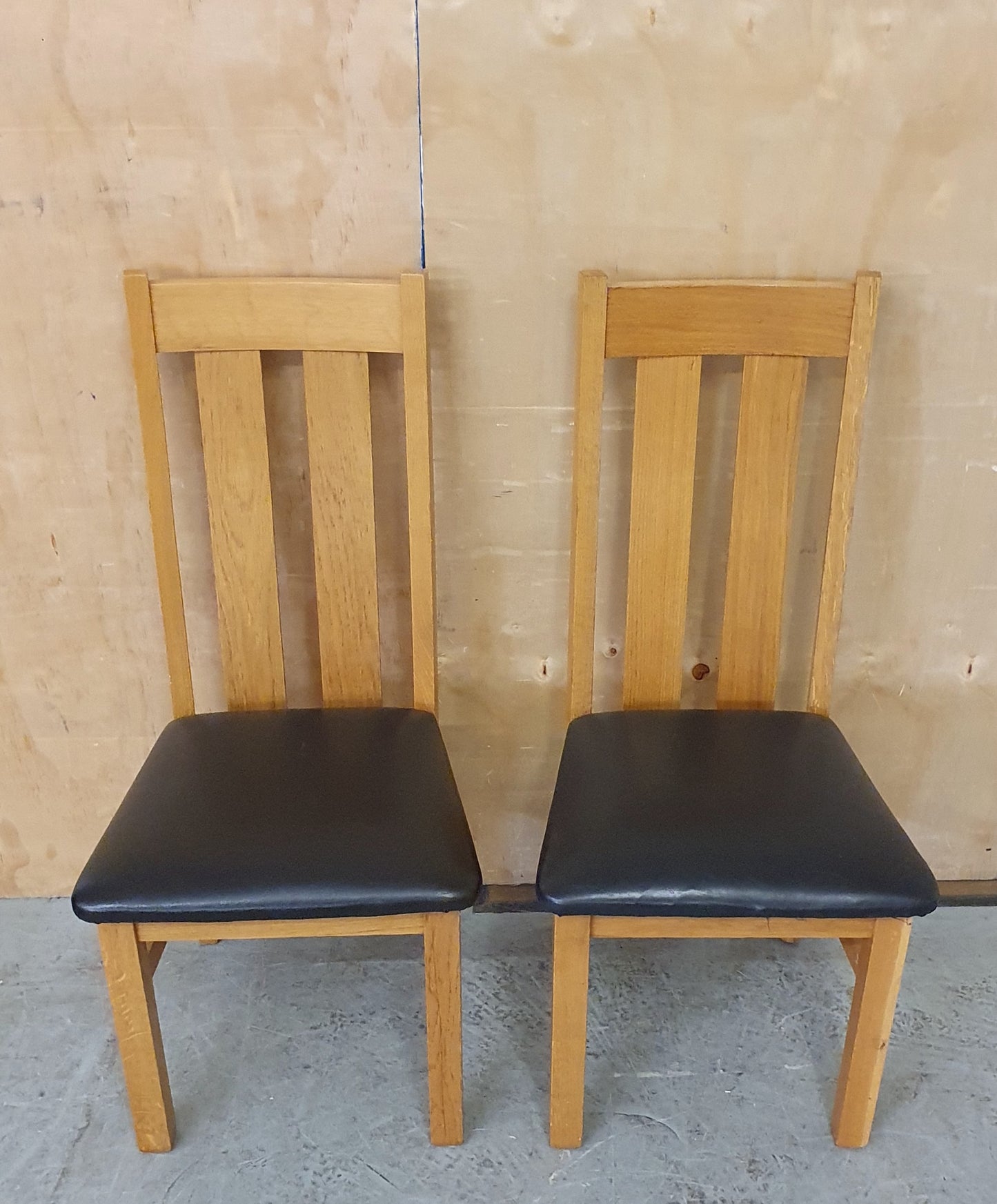 2 Matching Oak Dining Chairs with Dark Brown Faux Leather Seats - EL104354 / EL104355