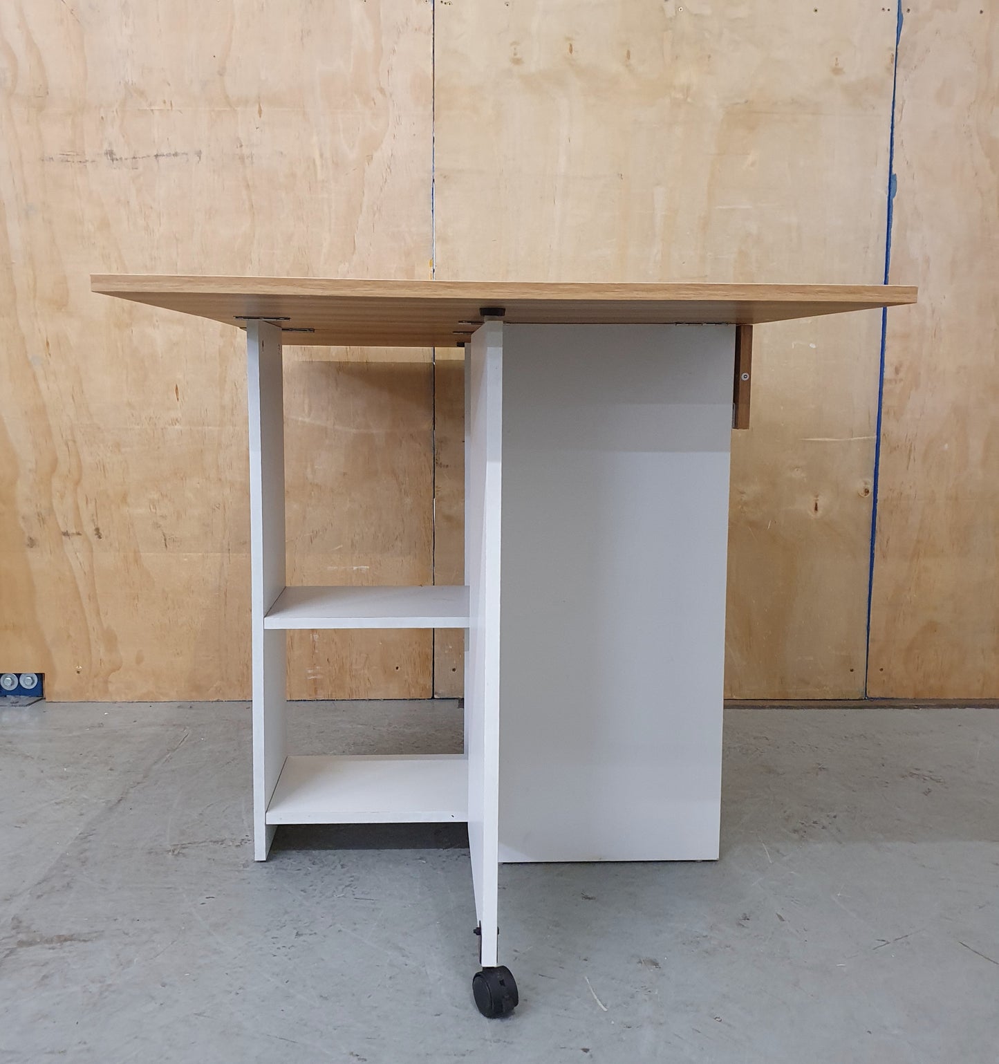 White Wood Drop Leaf Table with Lover Shelving and Castor Wheels - 103780