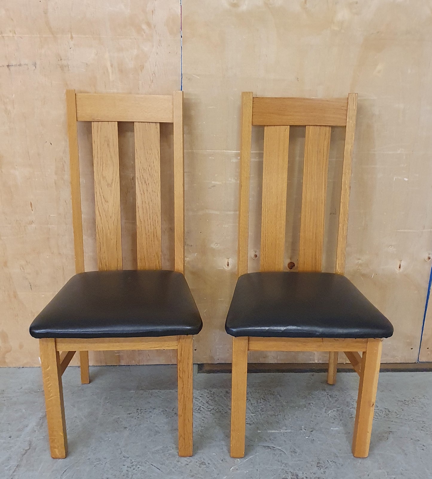 2 Matching Oak Dining Chairs with Dark Brown Faux Leather Seats - EL104354 / EL104355