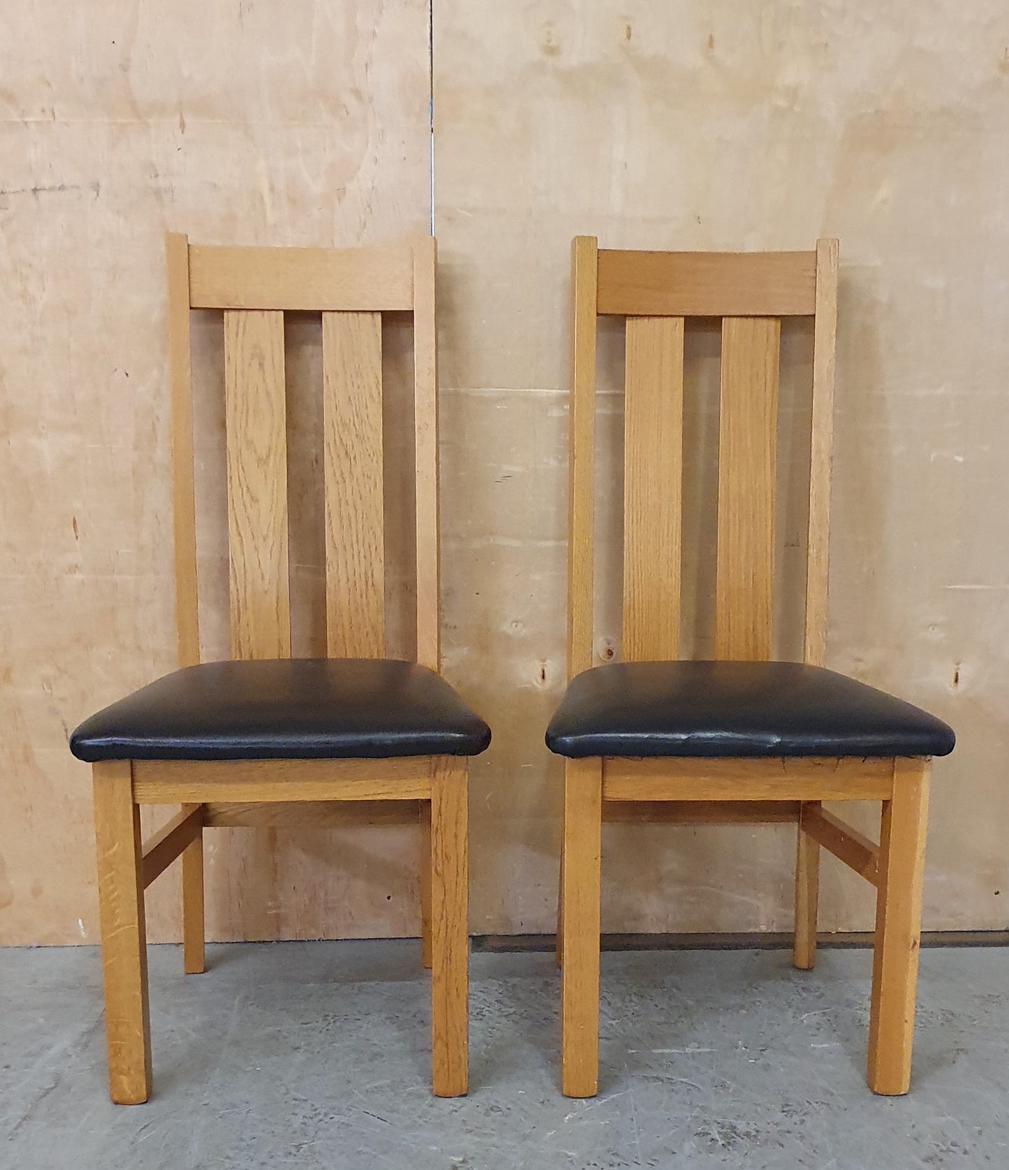 2 Matching Oak Dining Chairs with Dark Brown Faux Leather Seats - EL104354 / EL104355