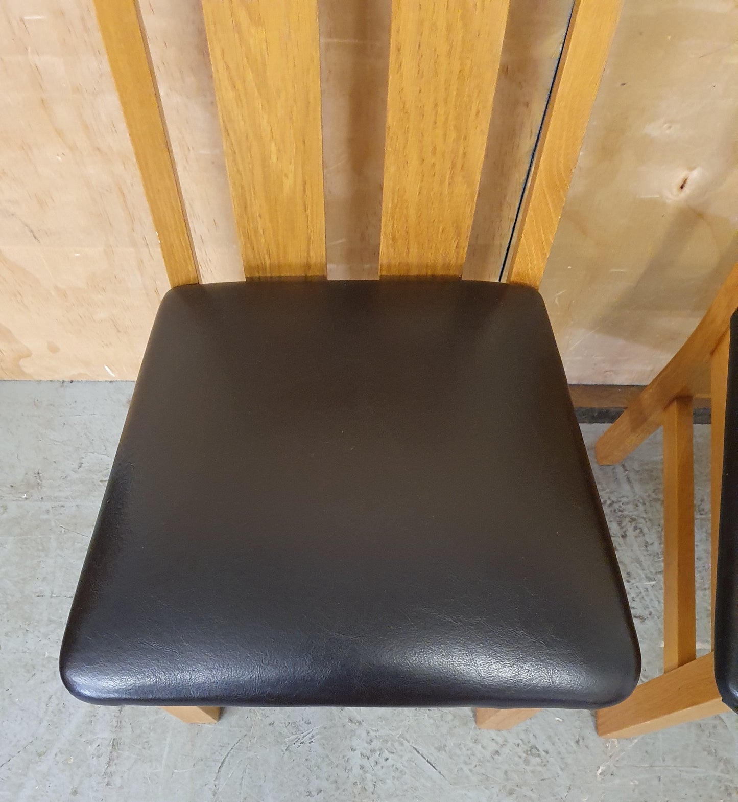 2 Matching Oak Dining Chairs with Dark Brown Faux Leather Seats - EL104354 / EL104355