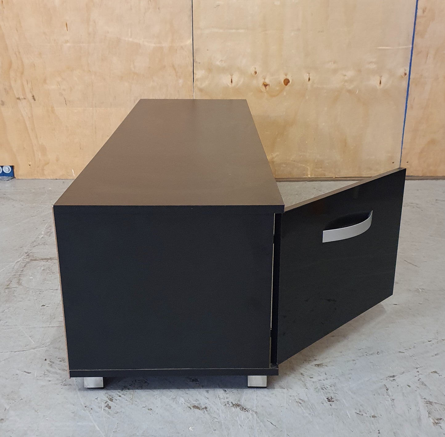 Black Gloss TV Stand with 2 Doors and Centre Glass Shelf - EL104258