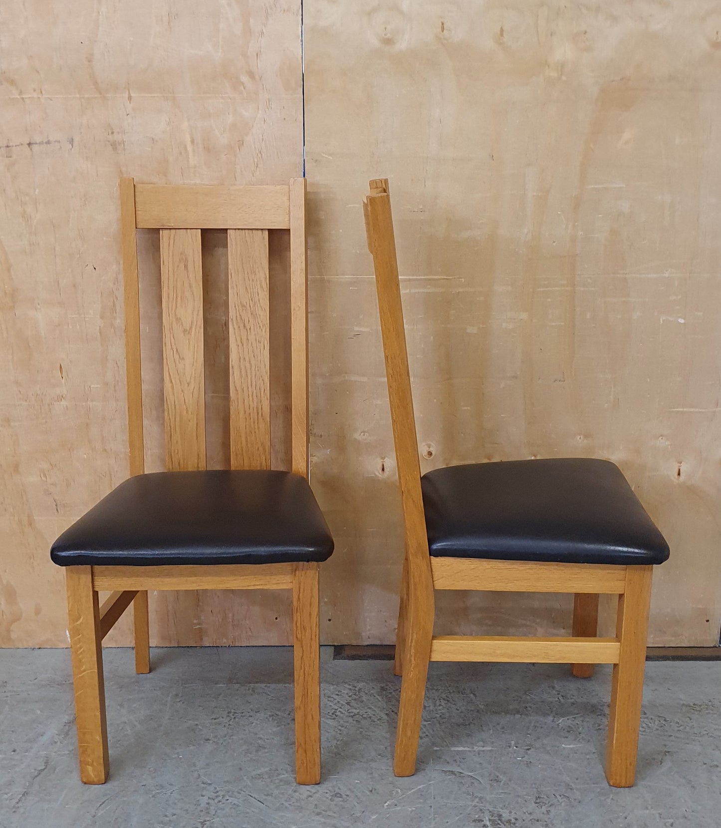 2 Matching Oak Dining Chairs with Dark Brown Faux Leather Seats - EL104354 / EL104355