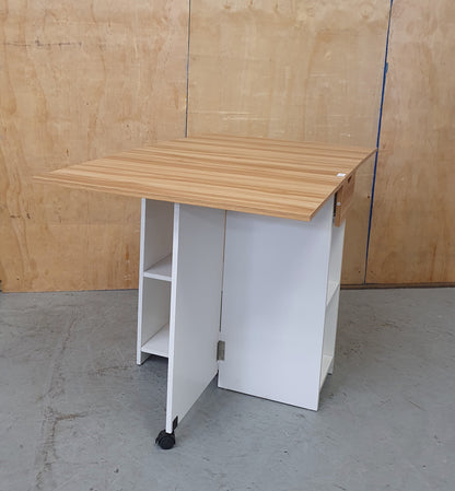 White Wood Drop Leaf Table with Lover Shelving and Castor Wheels - 103780