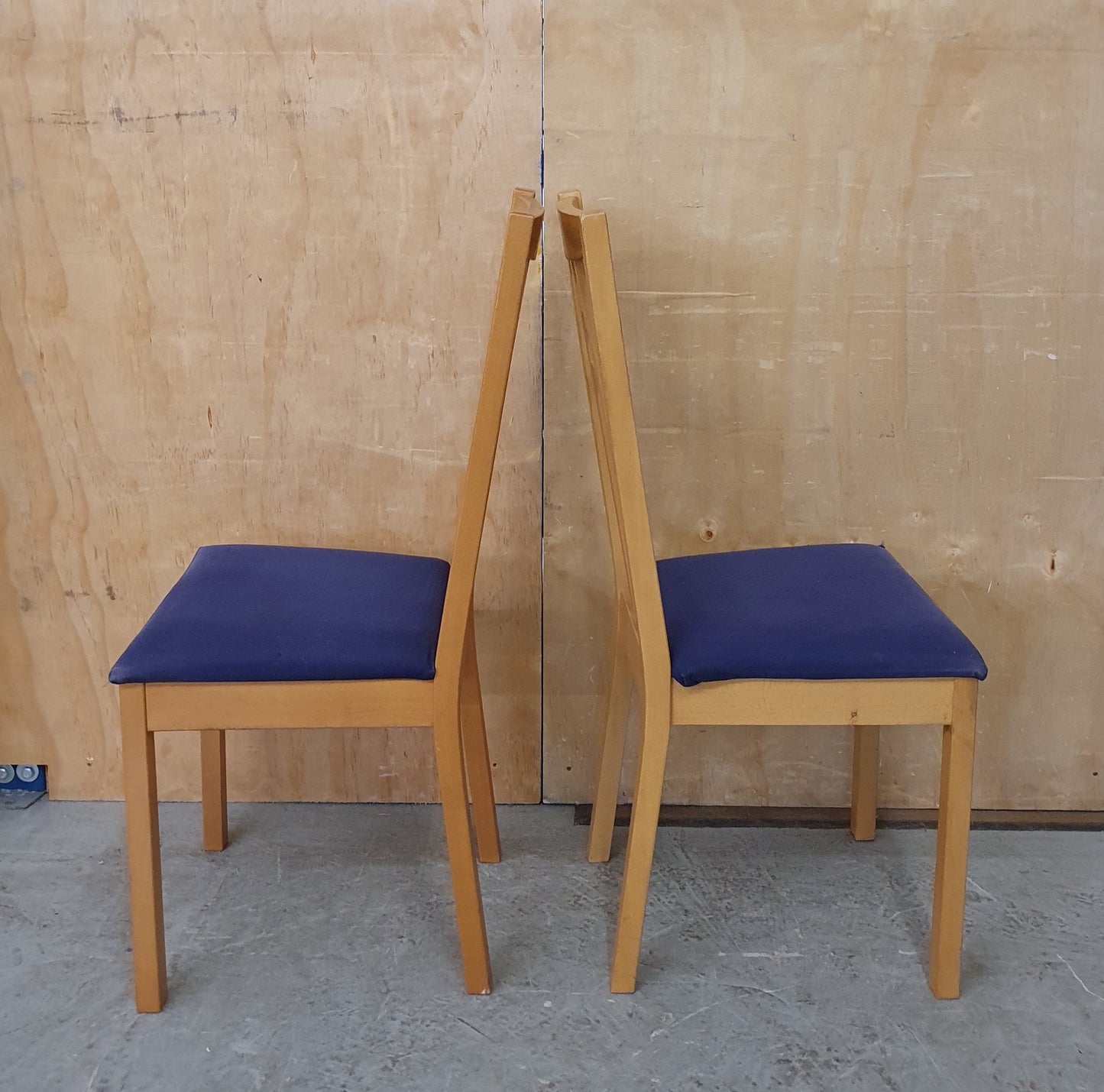 2 Matching Wood Dining Chairs with Blue Fabric Covered Seats - EL104557 / EL104558
