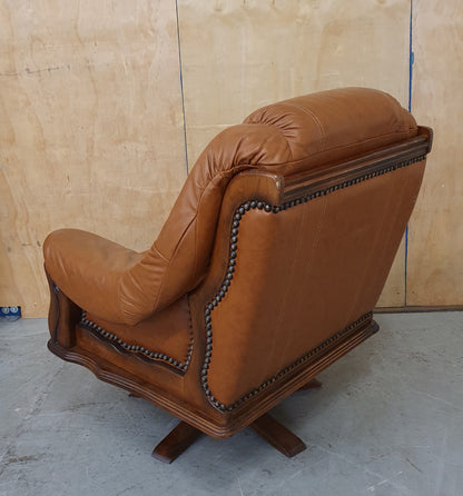 Single Brown Leather Rotating Armchair with Studded Side Detailing - 104610