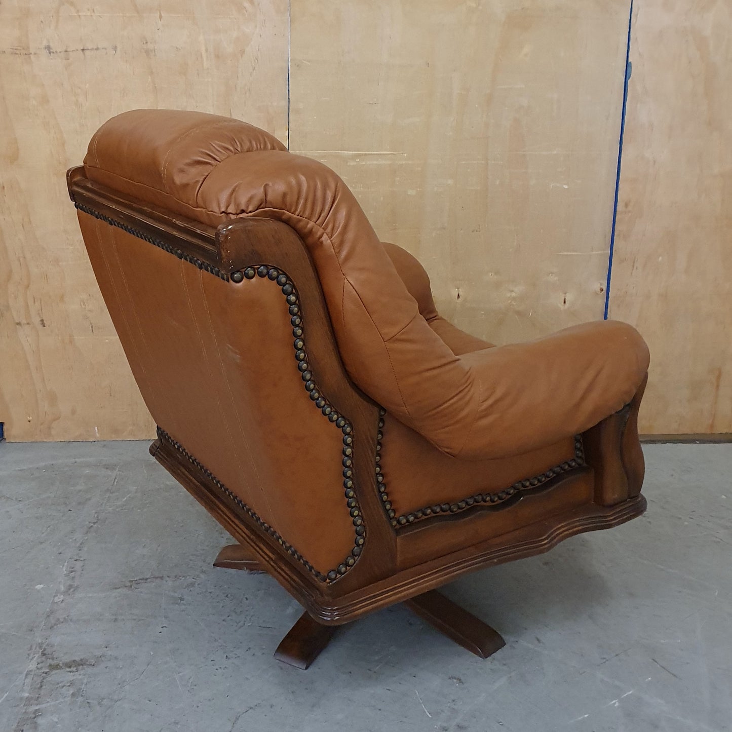 Single Brown Leather Rotating Armchair with Studded Side Detailing - 104610