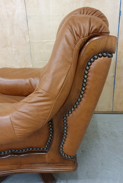 Single Brown Leather Rotating Armchair with Studded Side Detailing - 104610